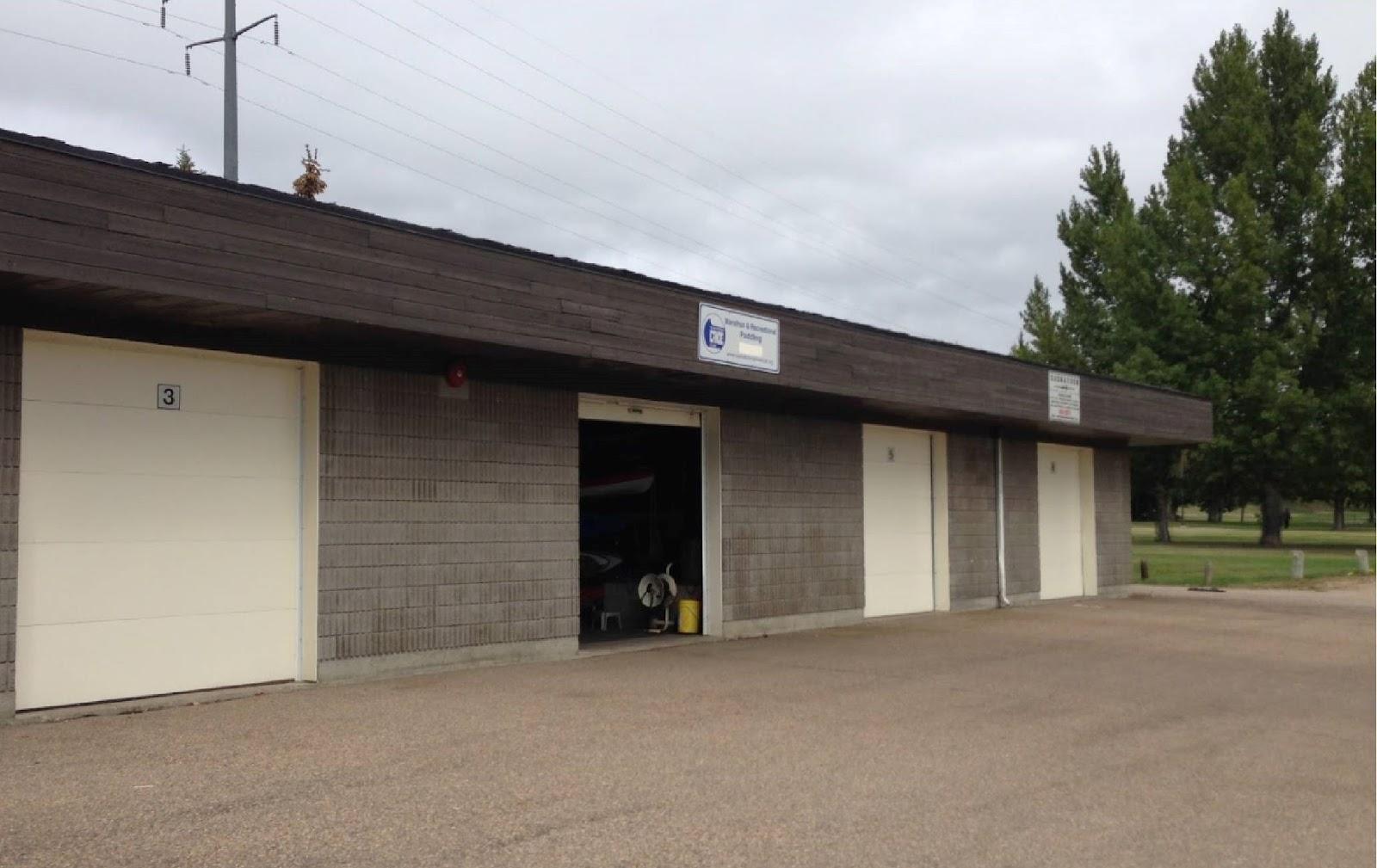 Photo of the boathouse with the SCC door open
